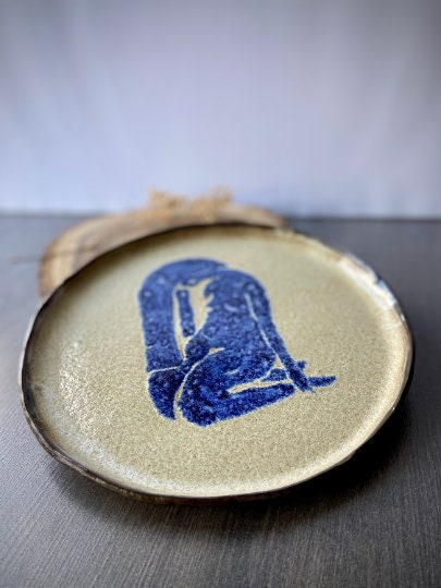 “Exhausted…”  ceramic plate, Mariia Luchuk